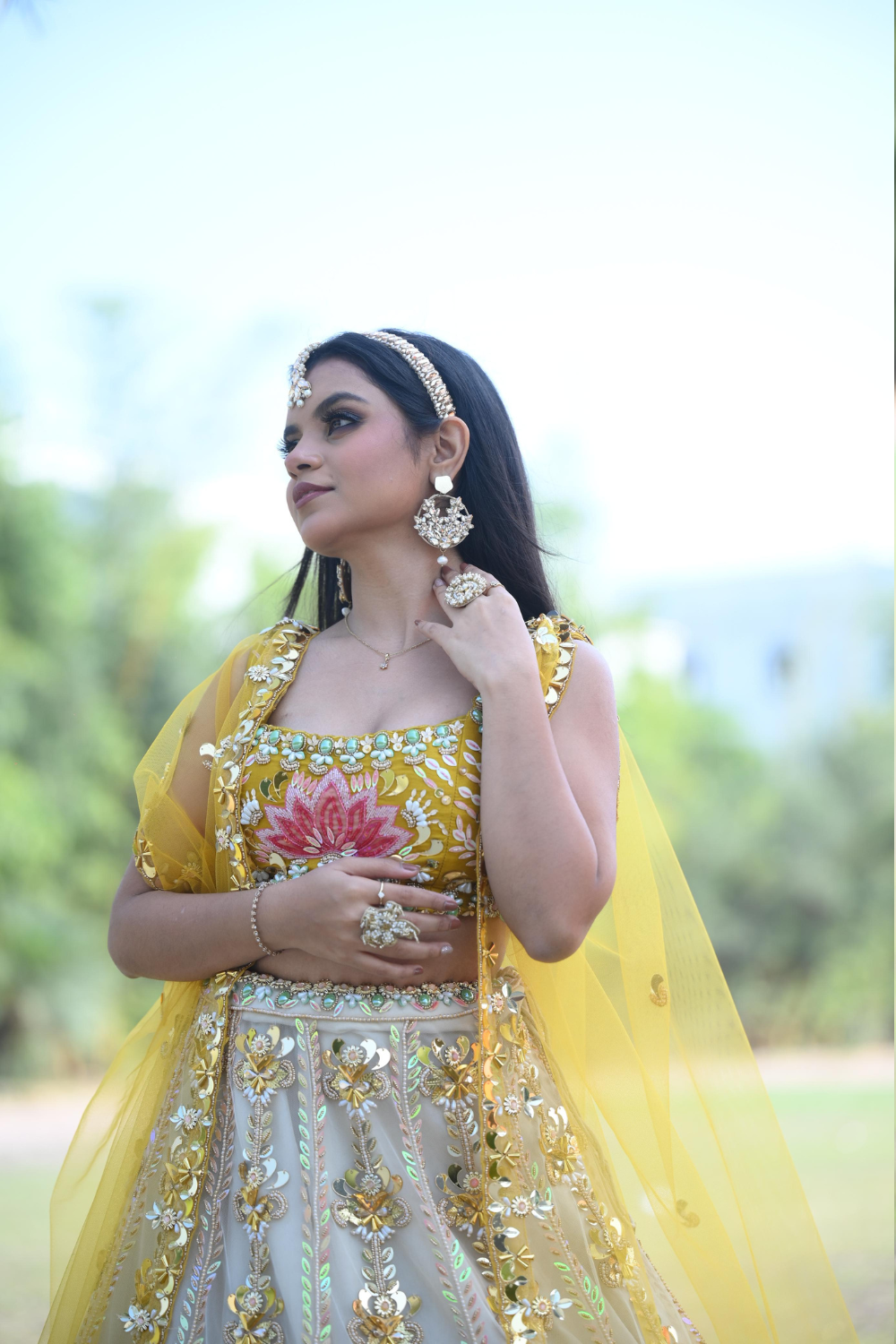 White & yellow lehenga choli with sequins and pearl work