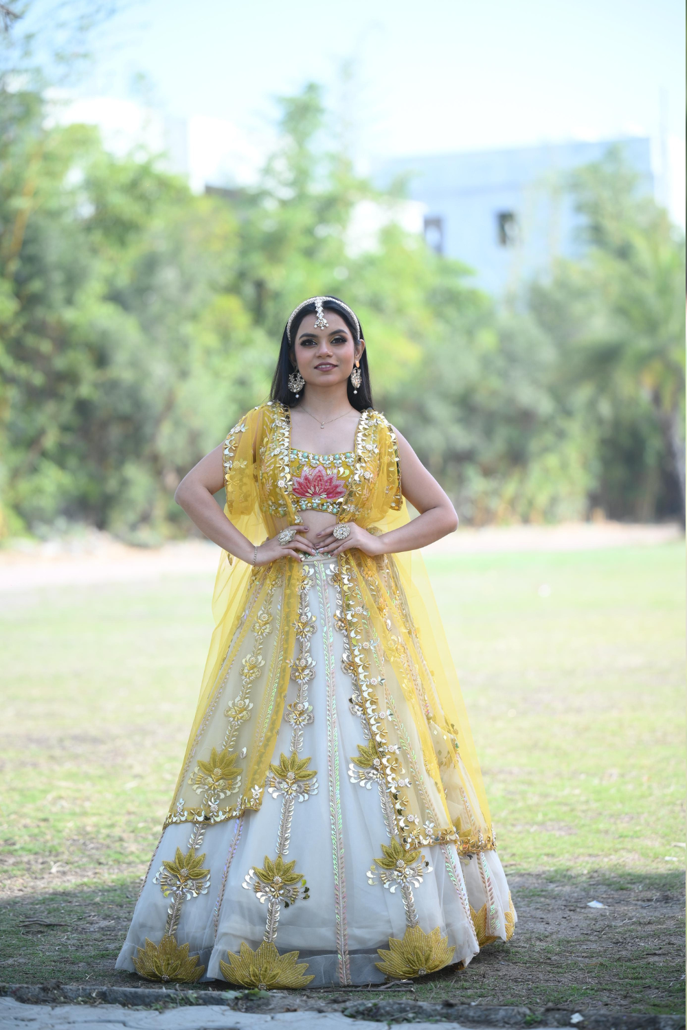 White & yellow lehenga choli with sequins and pearl work