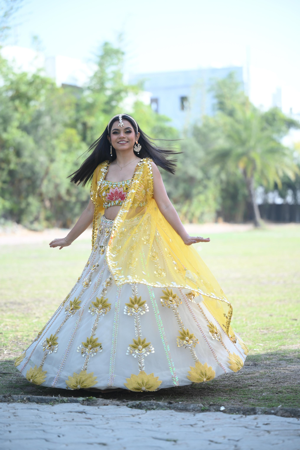White & yellow lehenga choli with sequins and pearl work