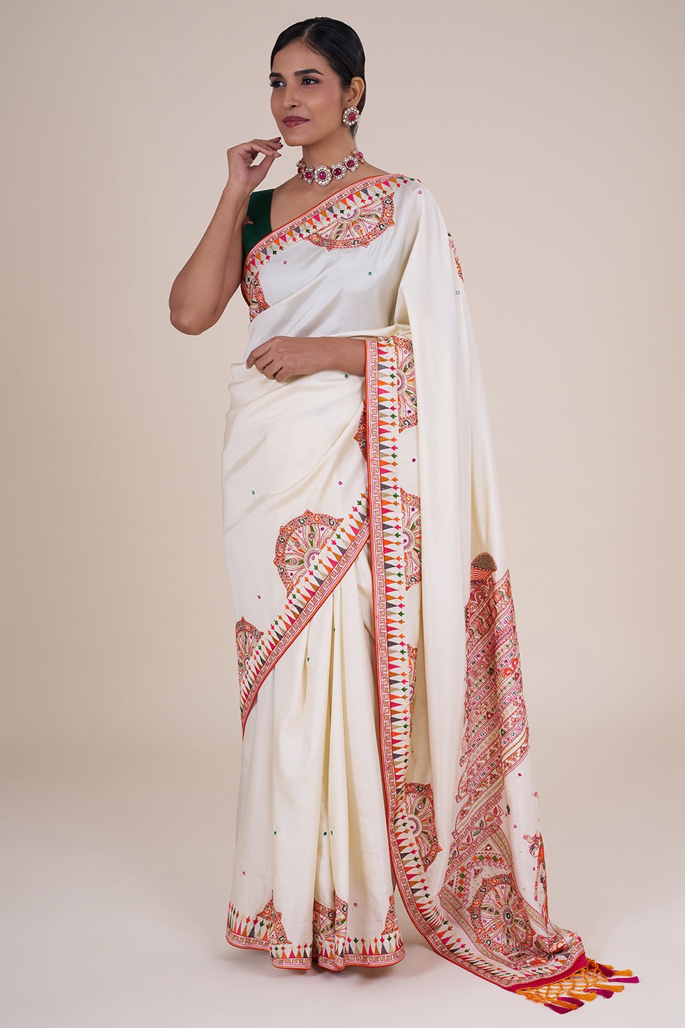 White folk-embroidered silk saree