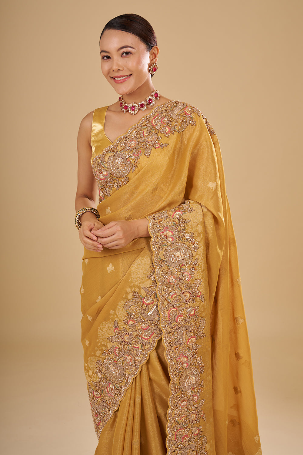 Antique Gold Tissue Saree with Zardozi Border and Unstitched Blouse