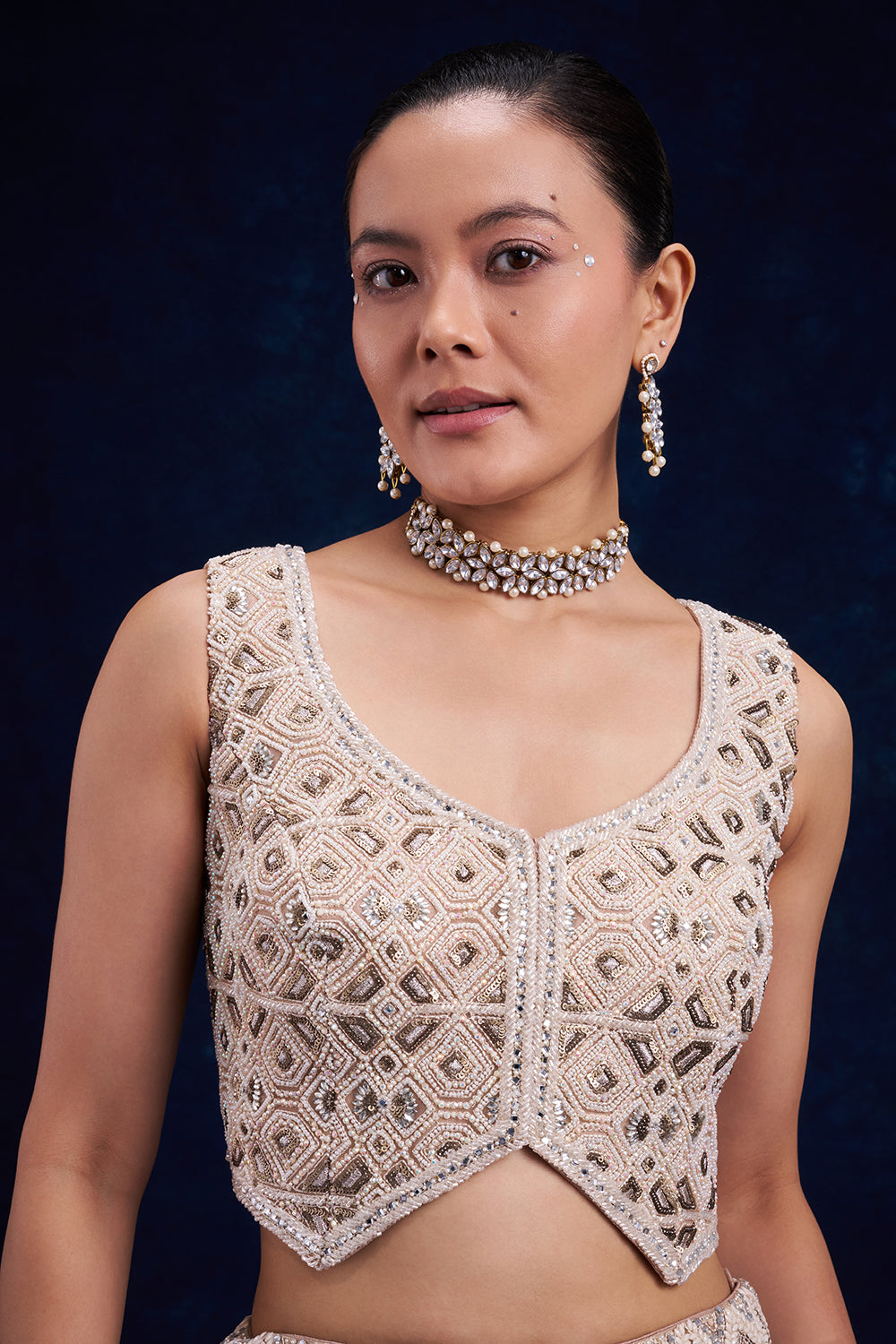 Ivory Gold Net Bridal Lehenga with Geometric Cutdana Work