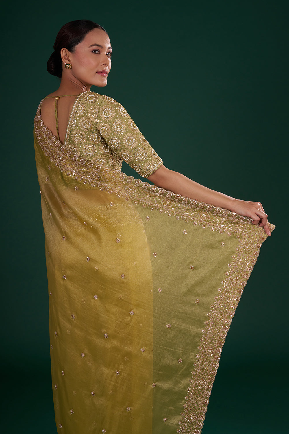 Mehendi Green Embroidered Shimmer Zari Tissue Saree with Rose Gold Sequin