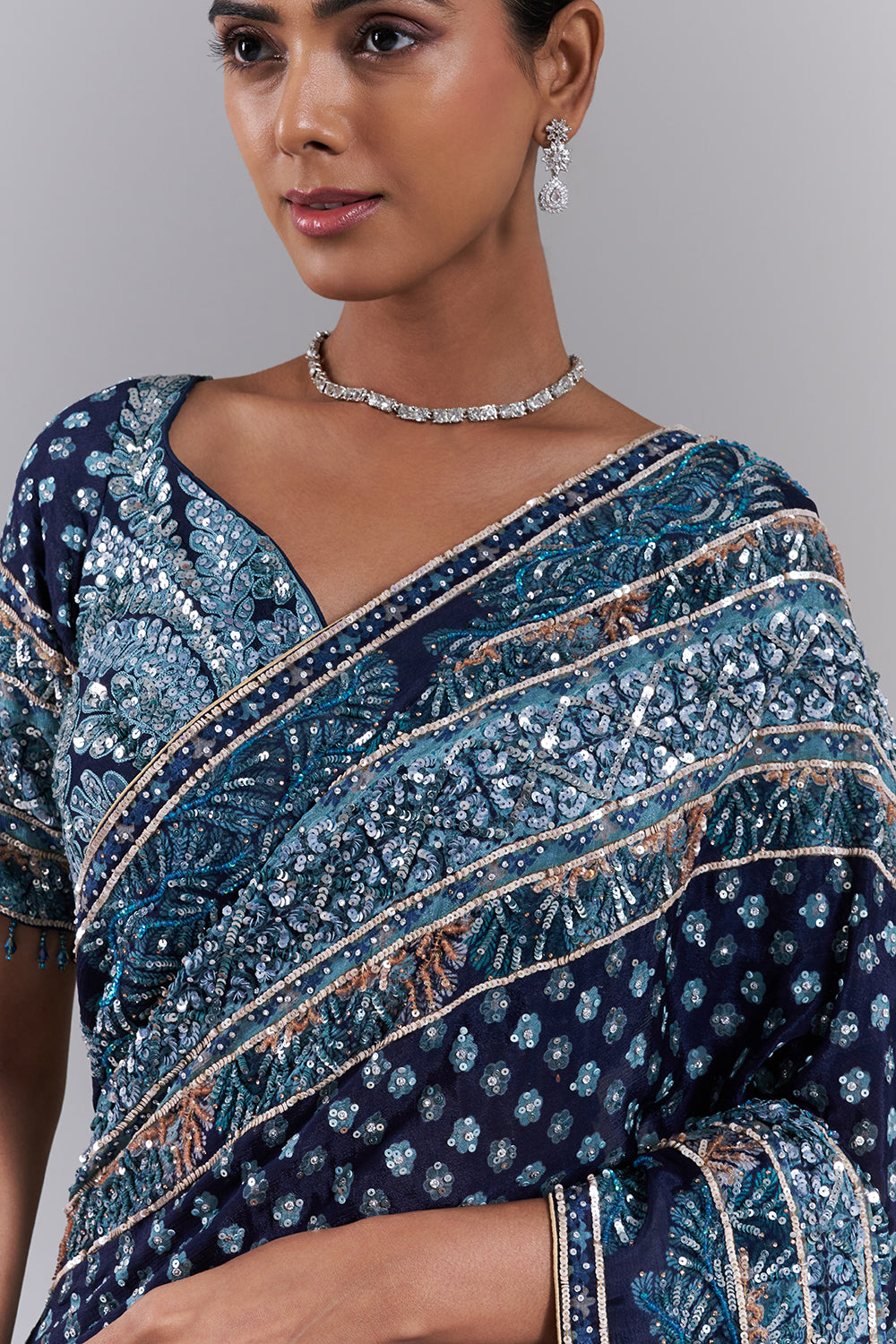 Navy Blue Georgette Embellished Saree And Stitched Blouse