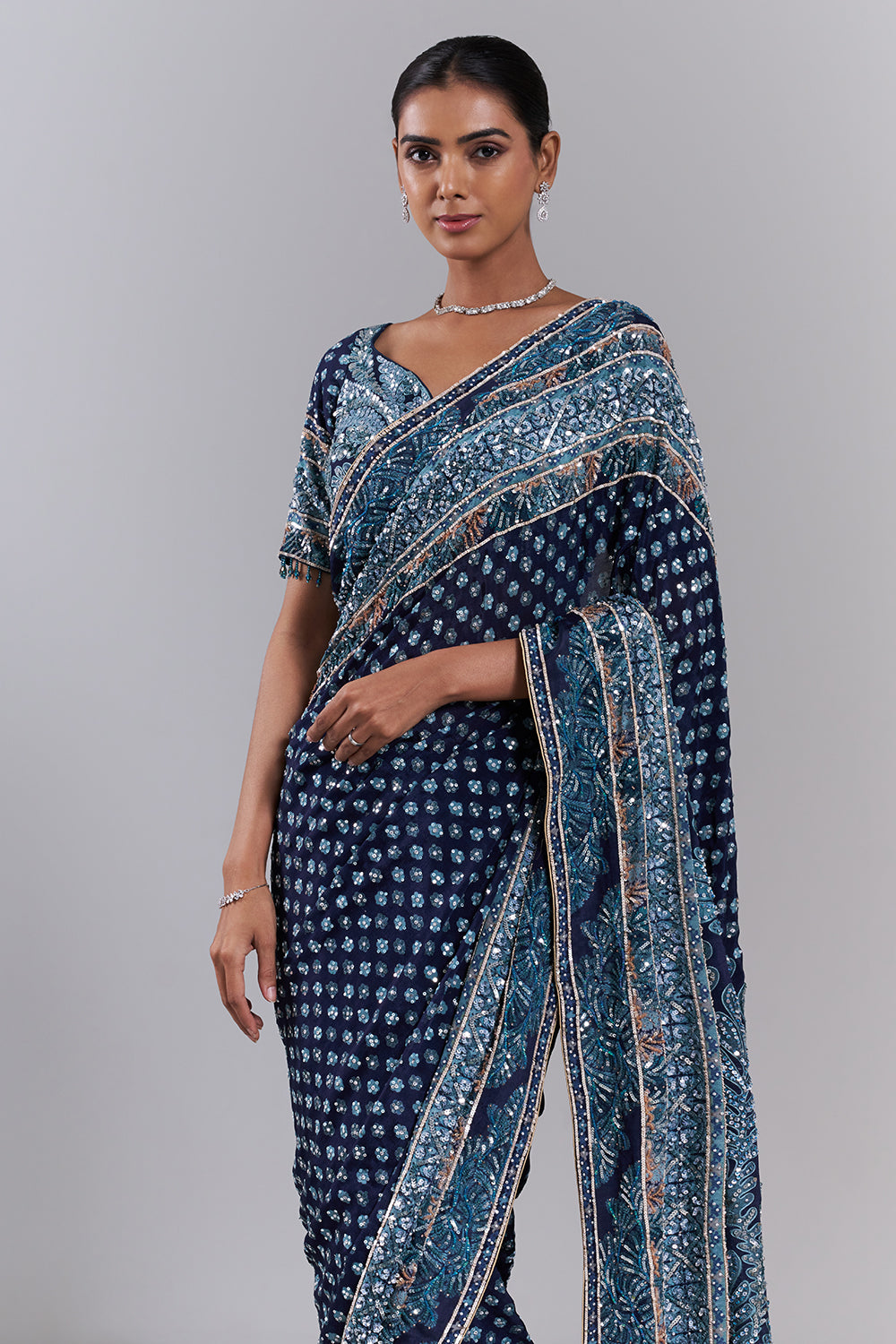 Navy Blue Georgette Embellished Saree And Stitched Blouse