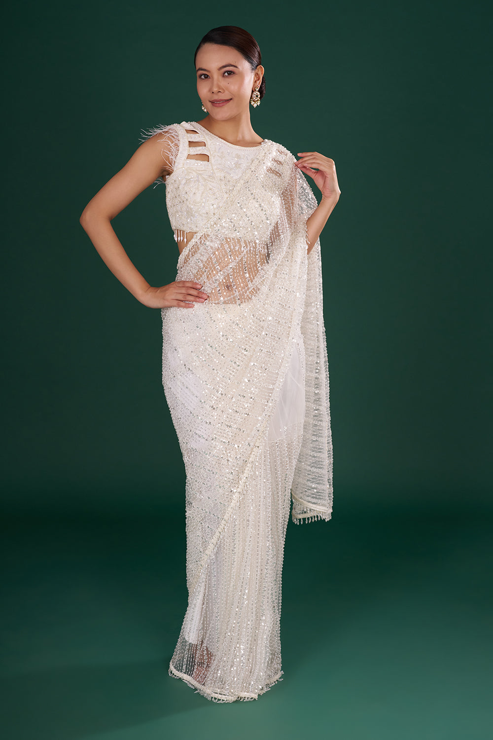 Off-White Net Saree in Linear Pattern and Unstitched Blouse