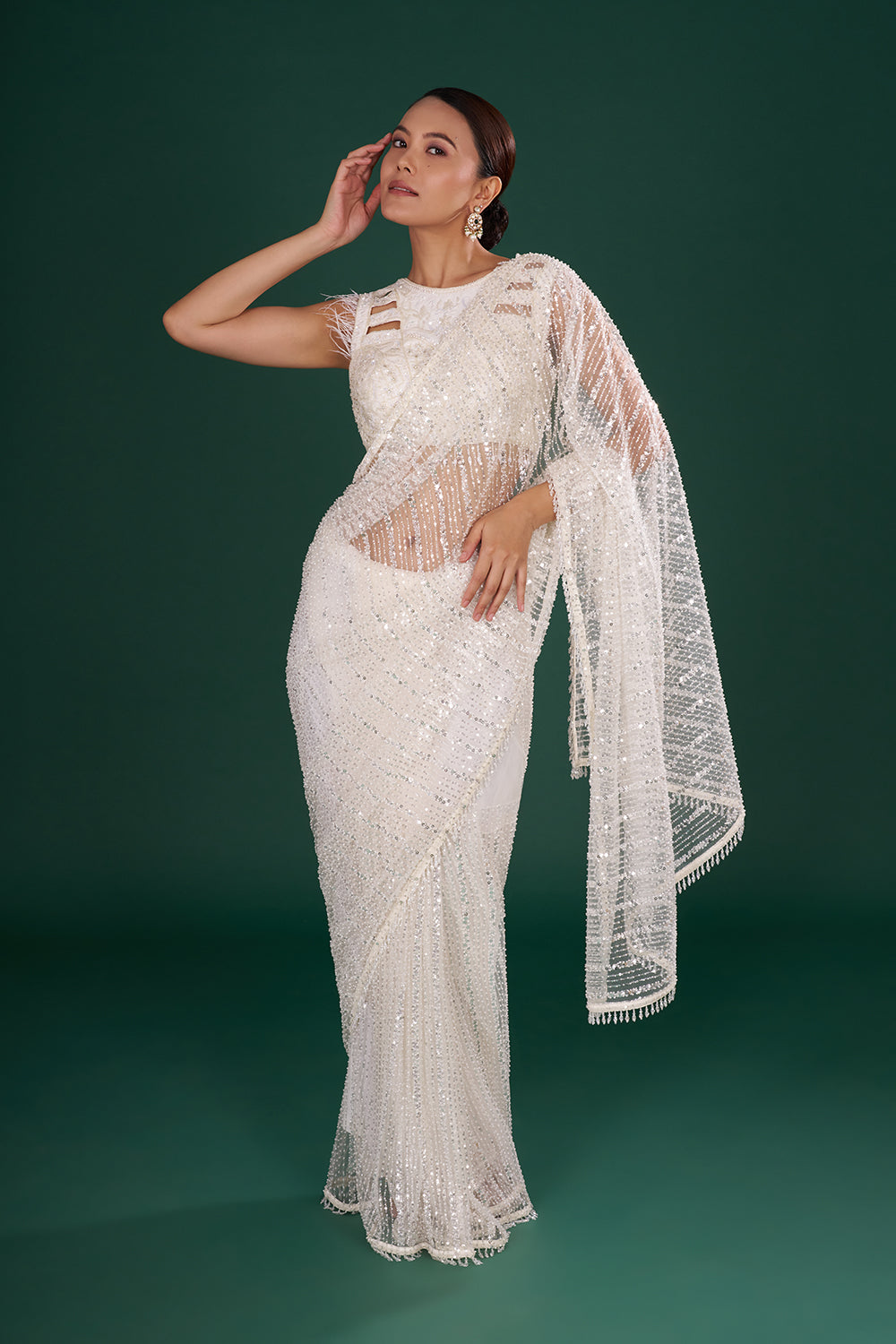 Off-White Net Saree in Linear Pattern and Unstitched Blouse