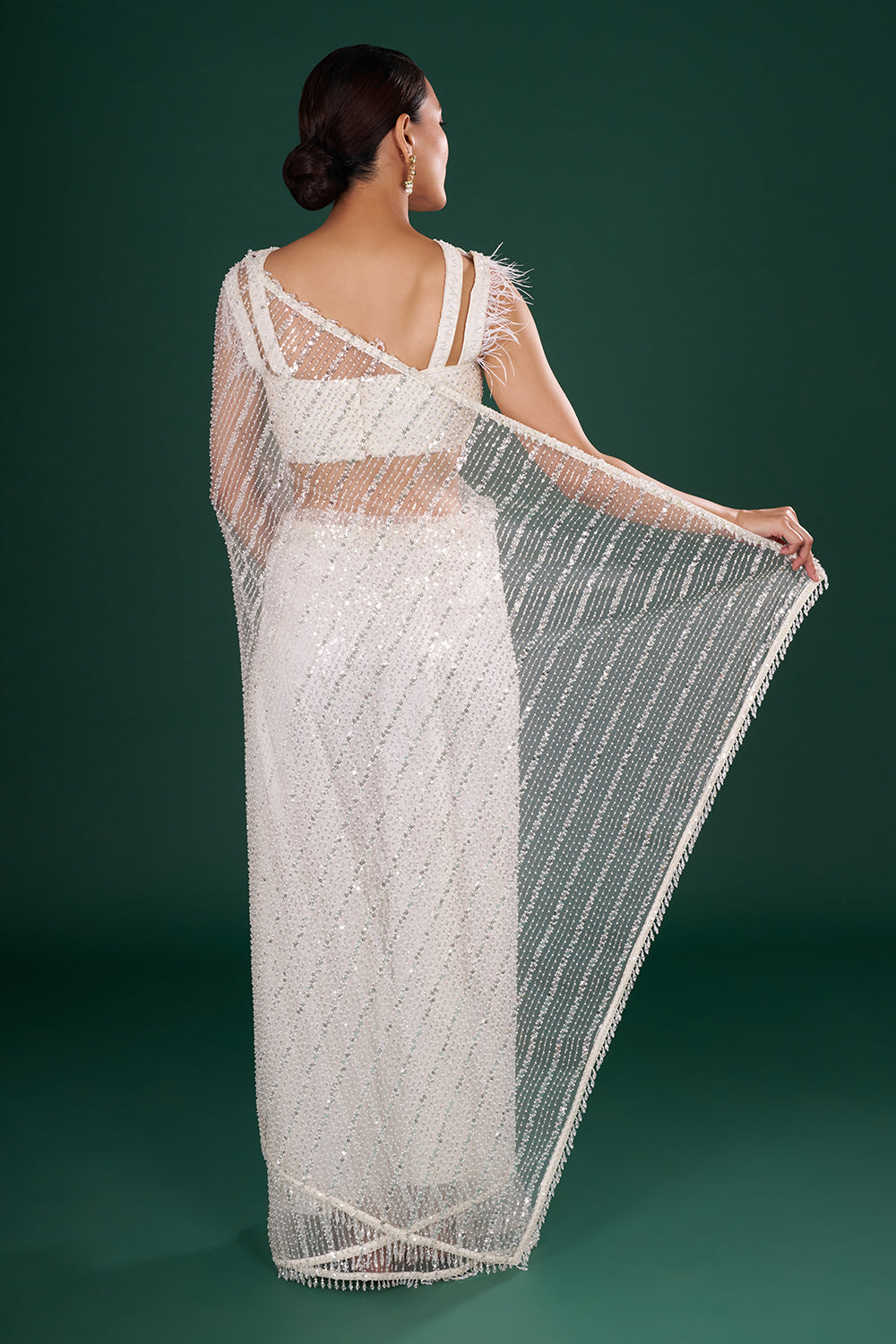 Off-White Net Saree in Linear Pattern and Unstitched Blouse