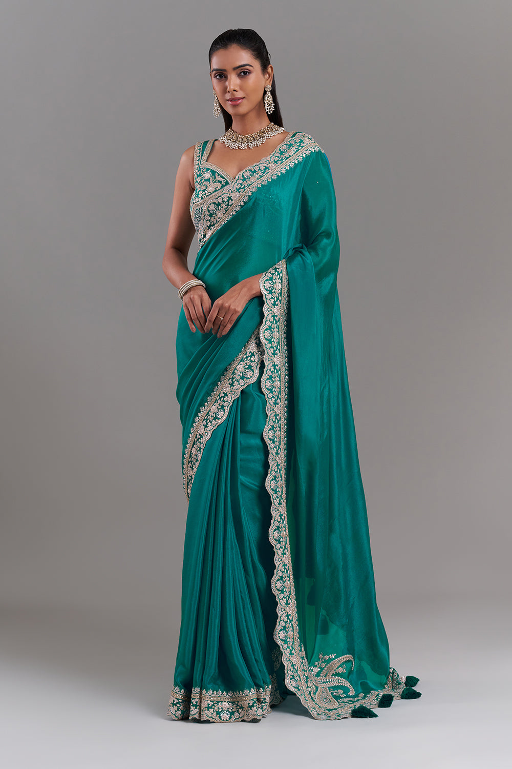 Teal Green Chiffon Saree with Ornate Embellished Border
