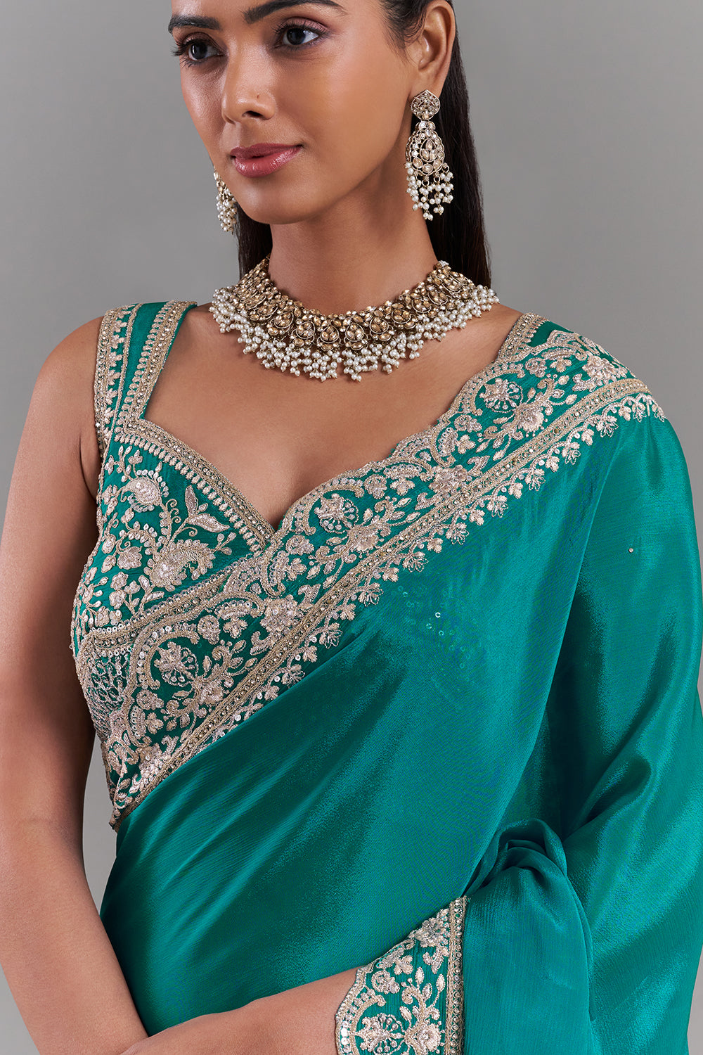 Teal Green Chiffon Saree with Ornate Embellished Border