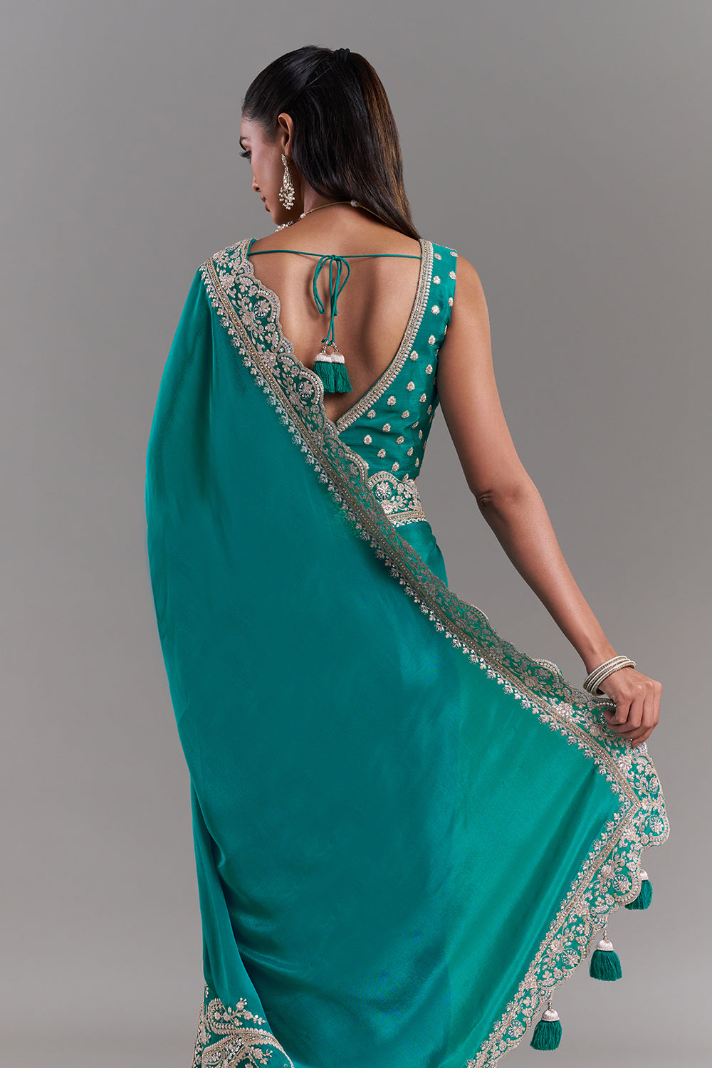 Teal Green Chiffon Saree with Ornate Embellished Border
