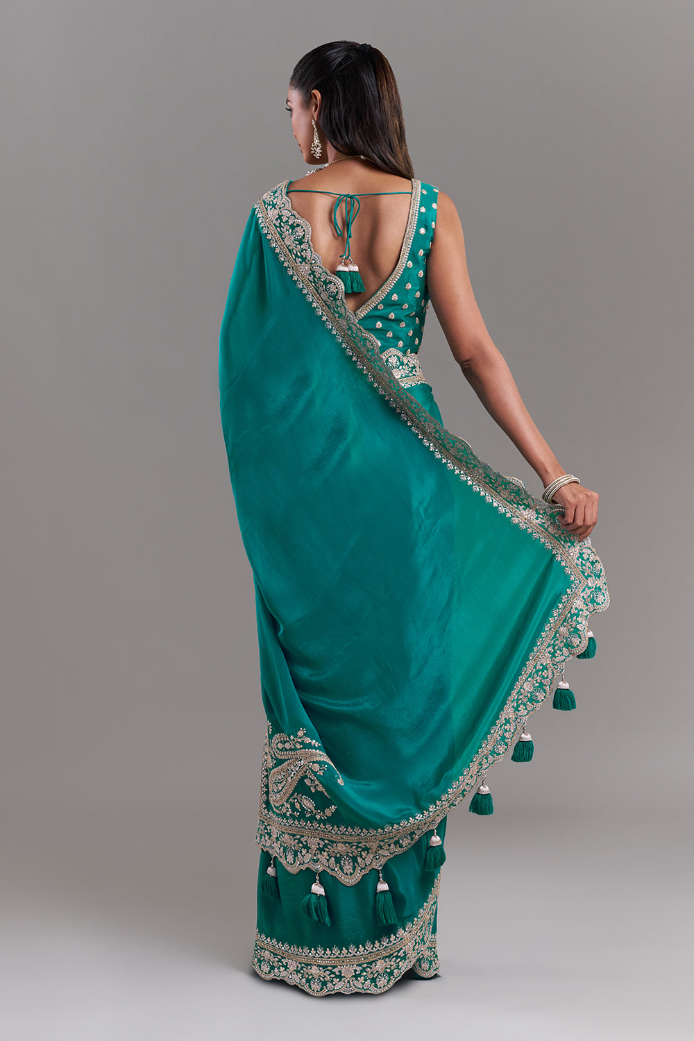 Teal Green Chiffon Saree with Ornate Embellished Border