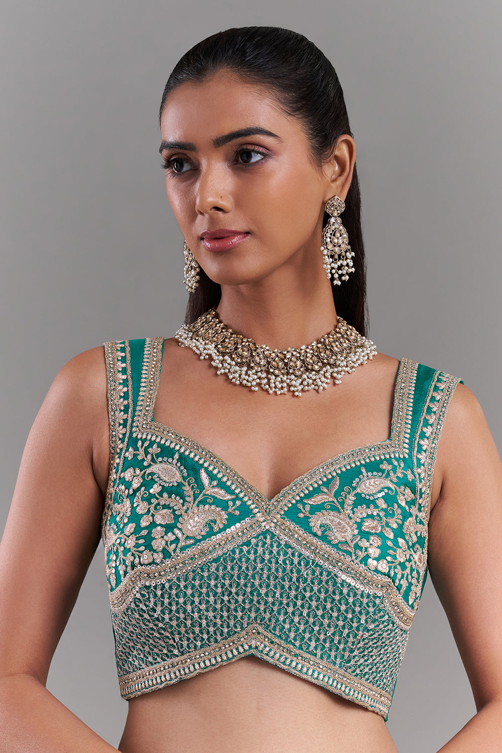 Teal Green Chiffon Saree with Ornate Embellished Border