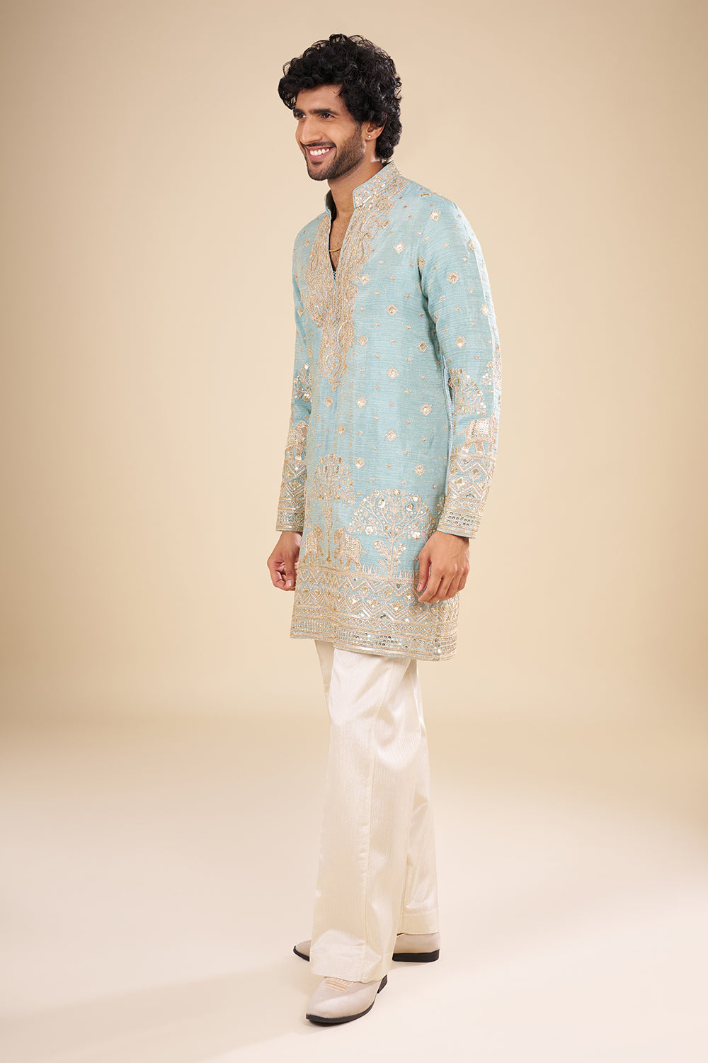 Teal Blue Silk Kurta Set with Nature-Inspired Embroidery