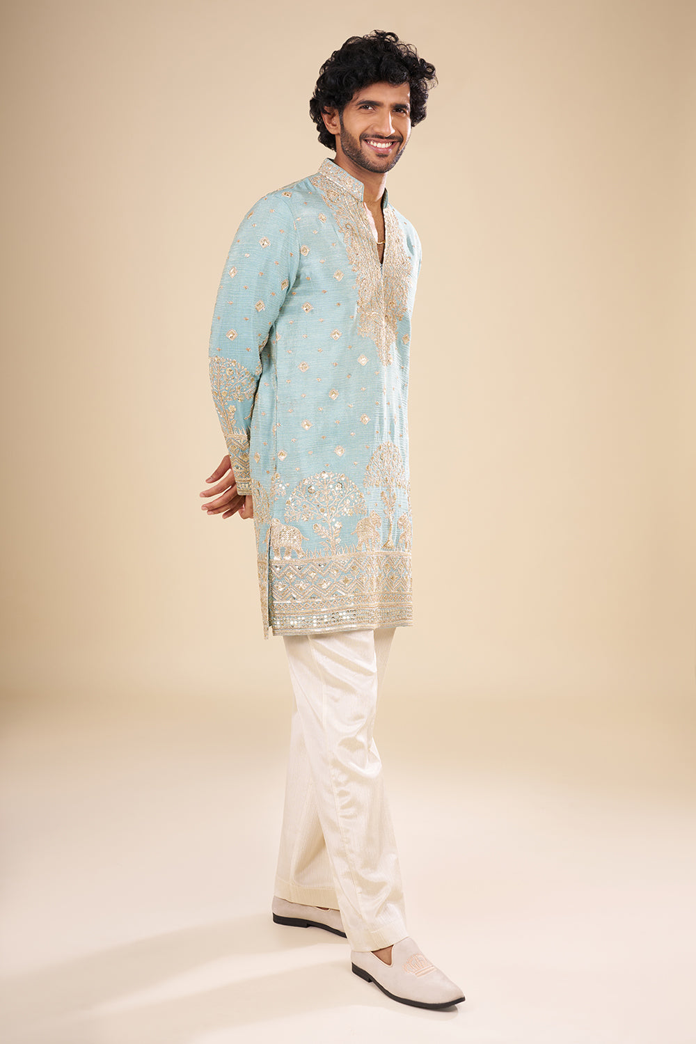 Teal Blue Silk Kurta Set with Nature-Inspired Embroidery