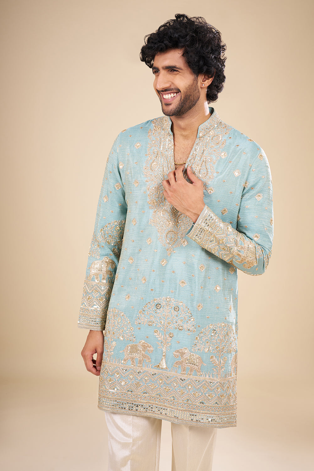 Teal Blue Silk Kurta Set with Nature-Inspired Embroidery