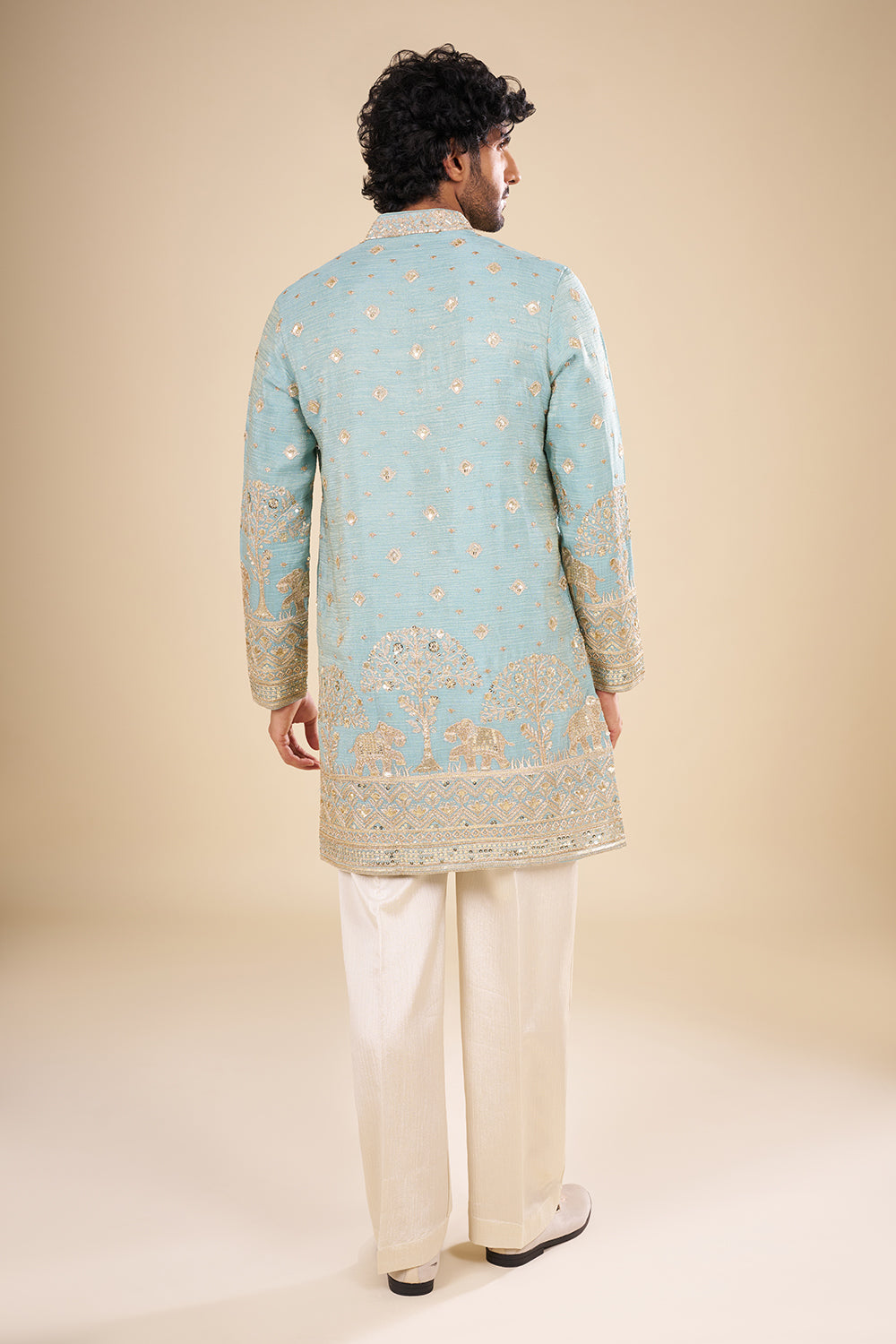 Teal Blue Silk Kurta Set with Nature-Inspired Embroidery