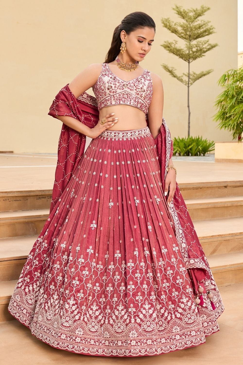 Dusty rose pink silk lehenga choli with sequins and hand cut dana work
