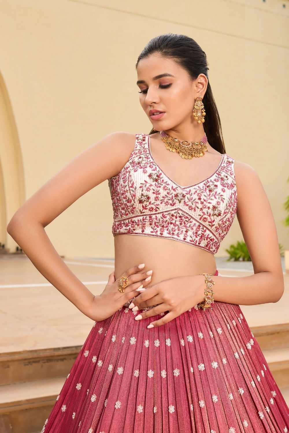 Dusty rose pink silk lehenga choli with sequins and hand cut dana work