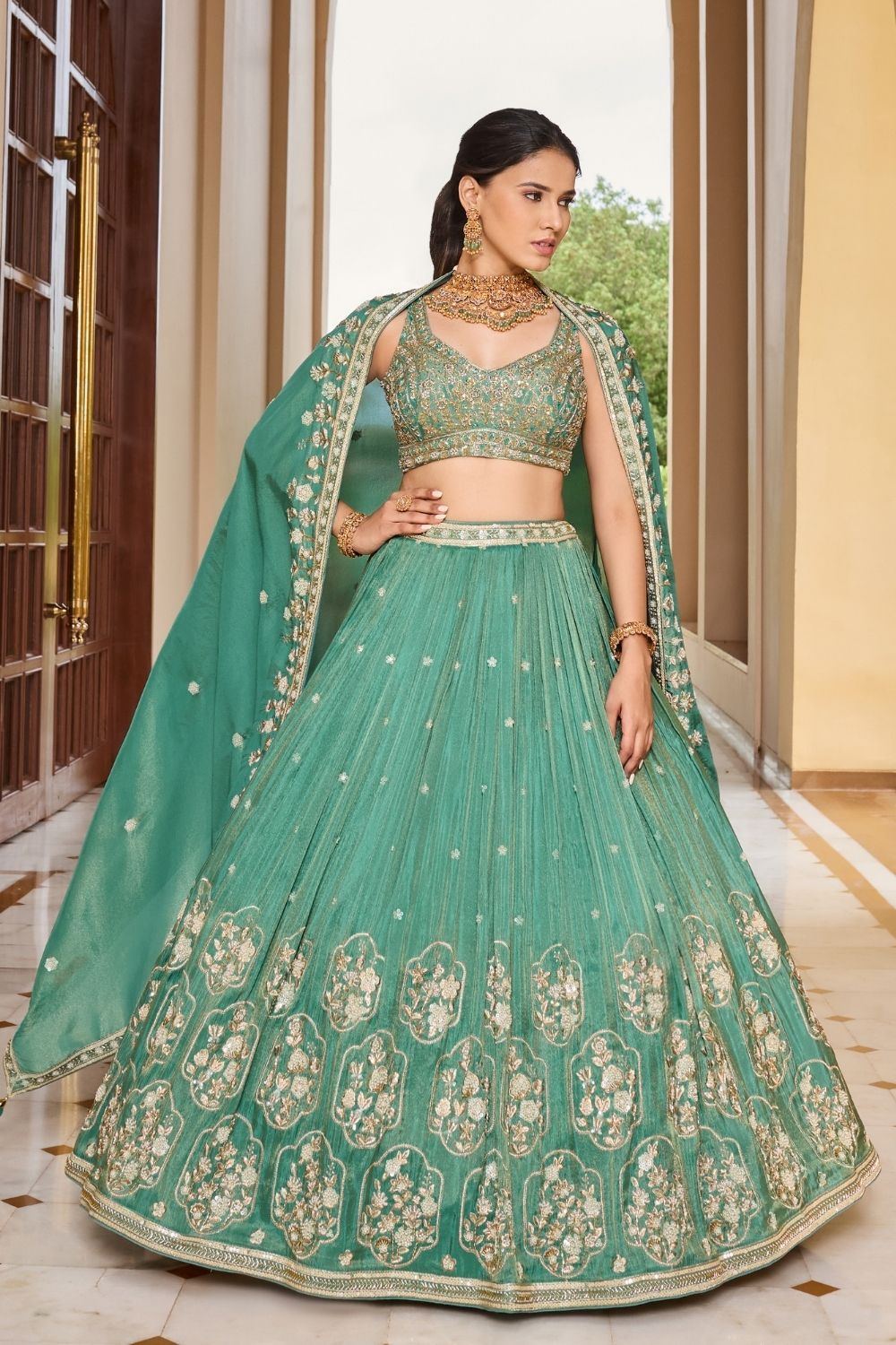Sea green silk lehenga choli with thread embroidery and sequins work