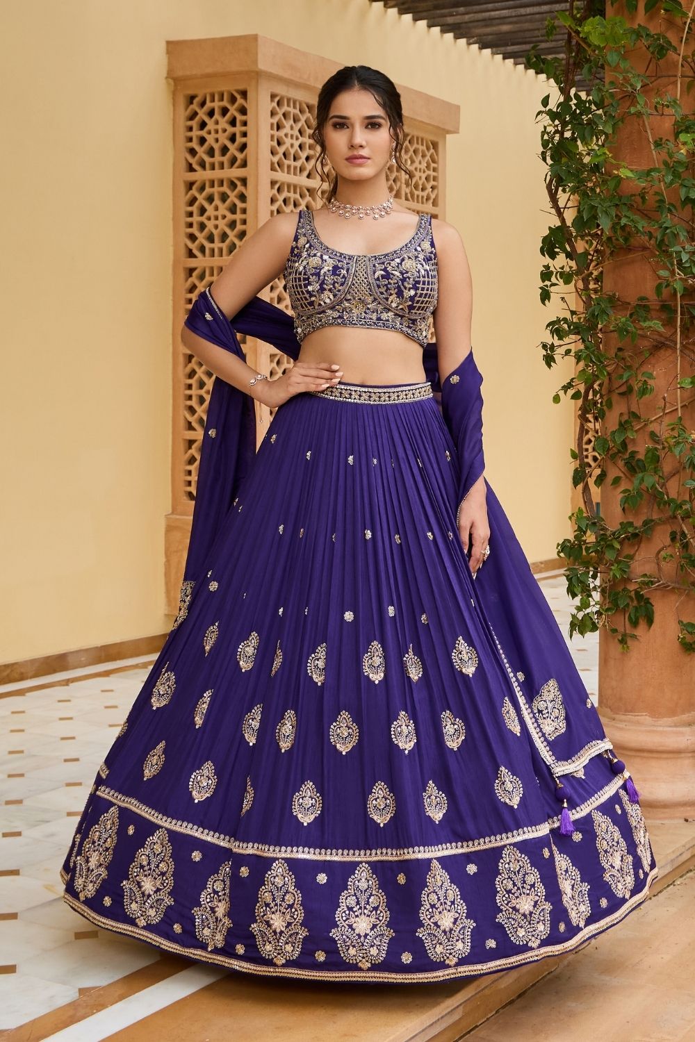 Navy blue silk lehenga choli with golden thread embroidery and sequins work