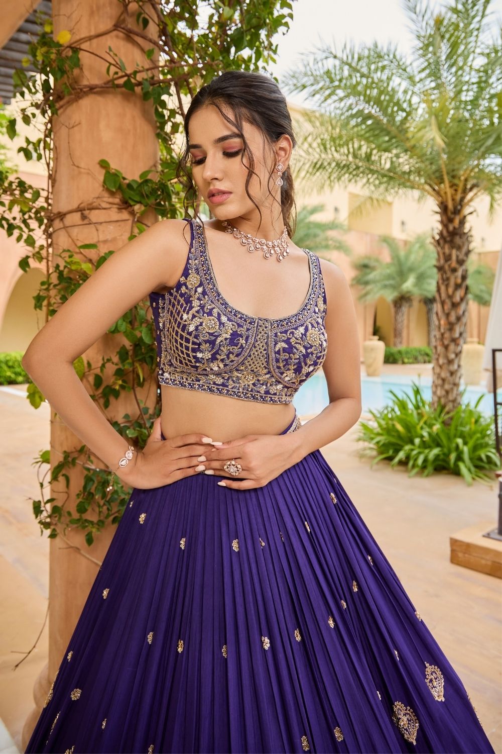 Navy blue silk lehenga choli with golden thread embroidery and sequins work