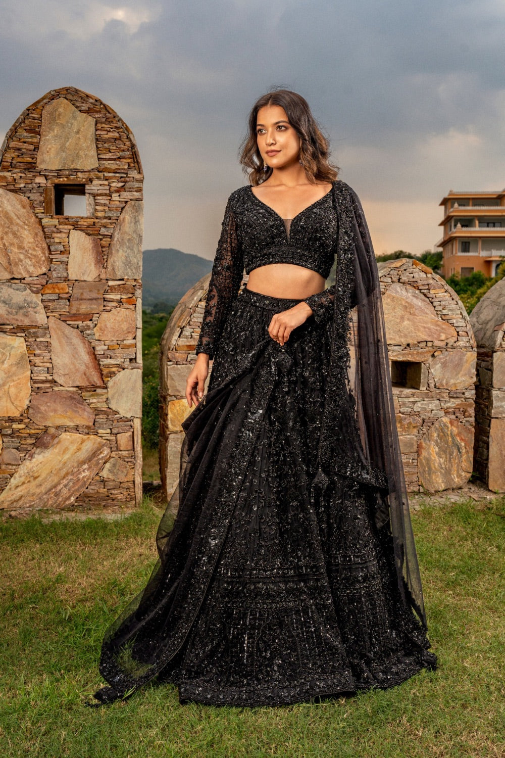 Black net lehenga choli with hand cut dana and moti work