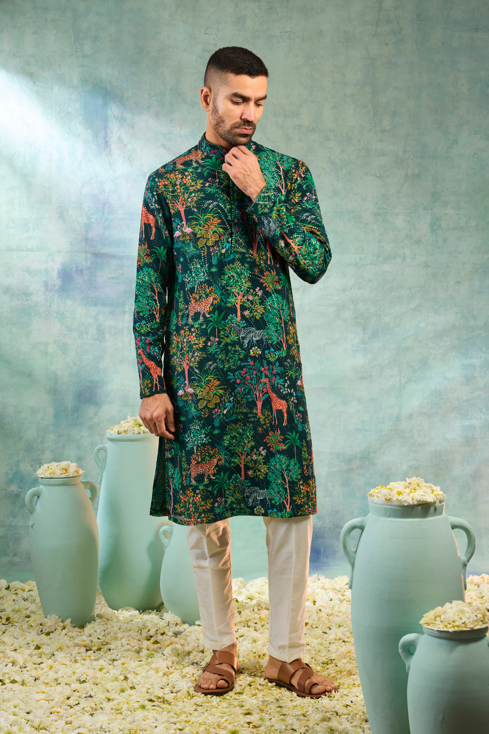 Deep green kurta set with forest print work