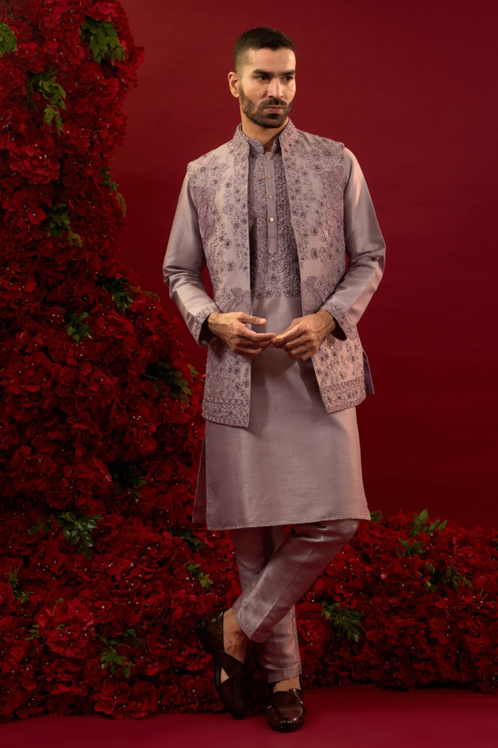 Mauve silk sherwani with detailed hand and machine work