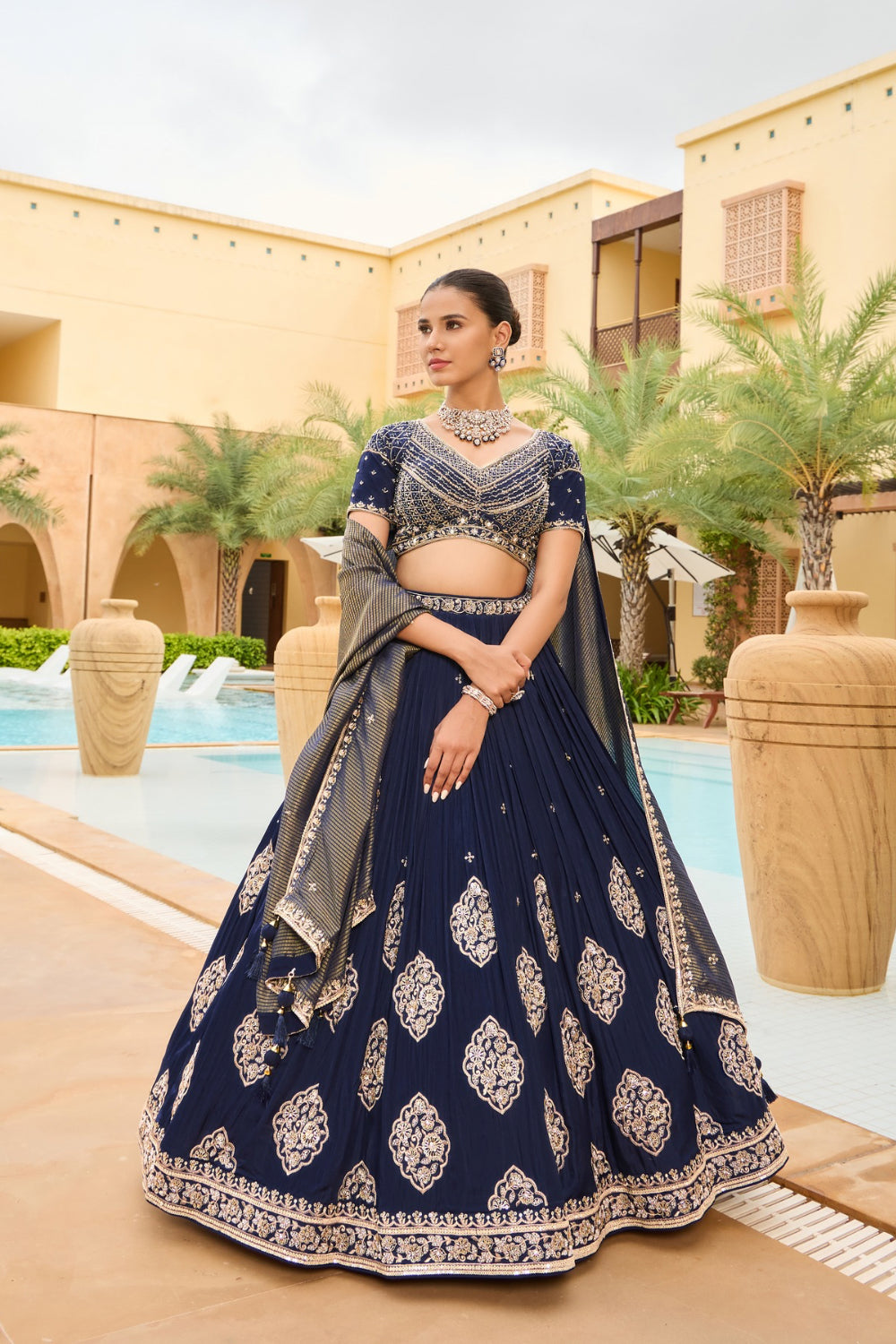 Royal blue silk lehenga choli with golden thread embroidery and sequins work