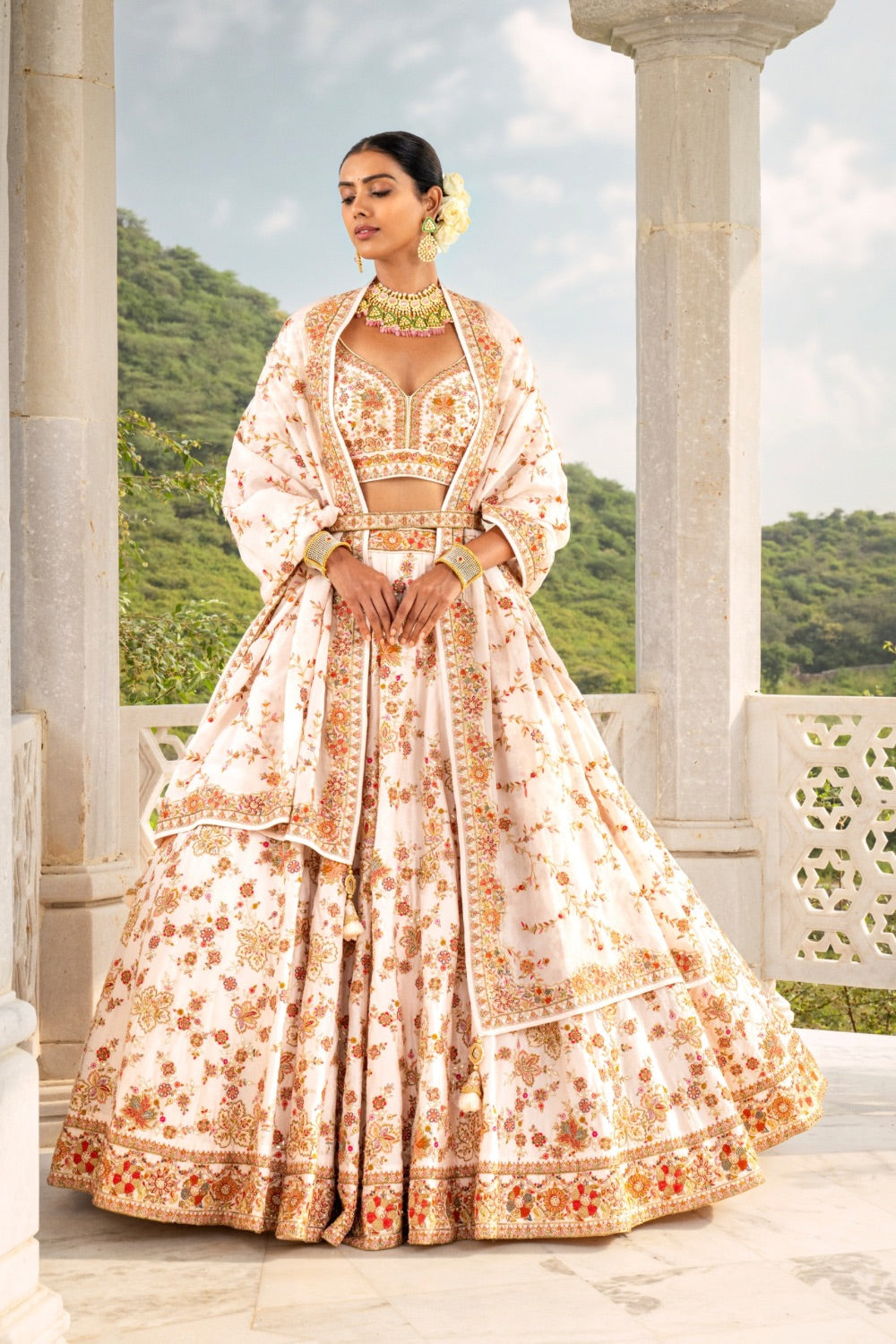 Off-White silk lehenga choli with zardozi, pearl, resham and cut dana work