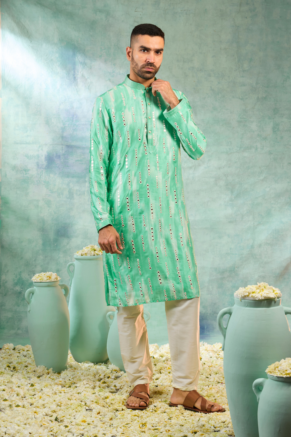 Sea green silk kurta set with off white thread work and mirror work