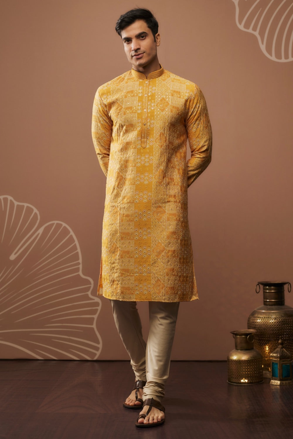 Bright yellow silk kurta and pajama with hand and machine work