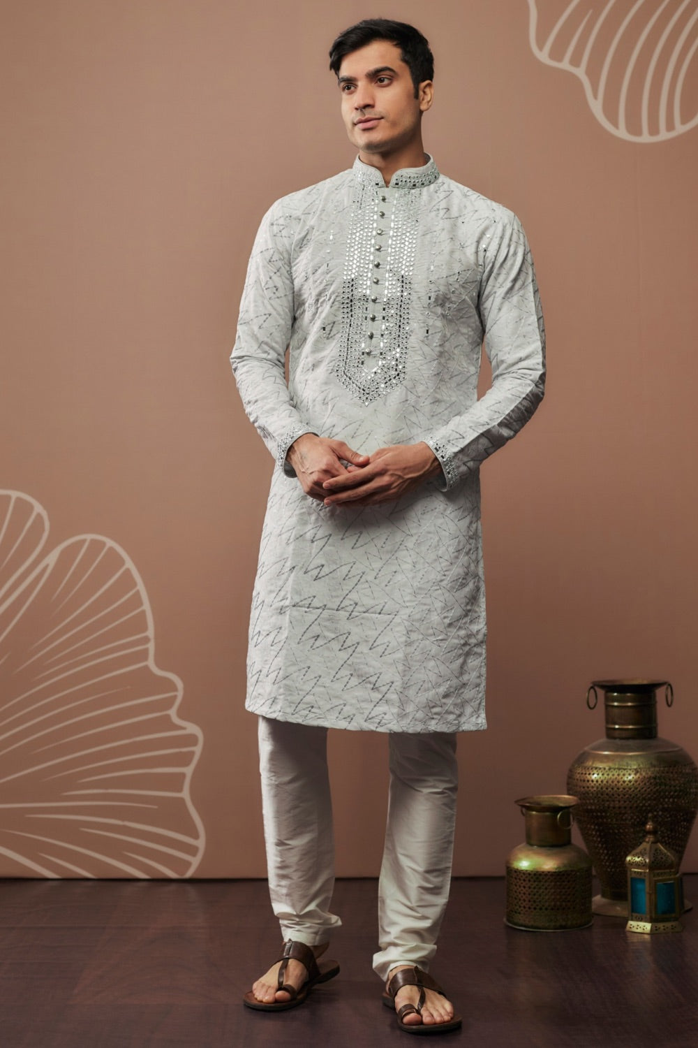 White silk kurta set with hand and machine work