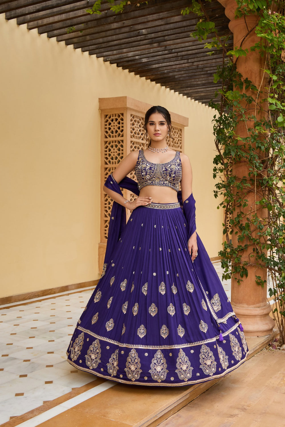 Navy blue silk lehenga choli with golden thread embroidery and sequins work