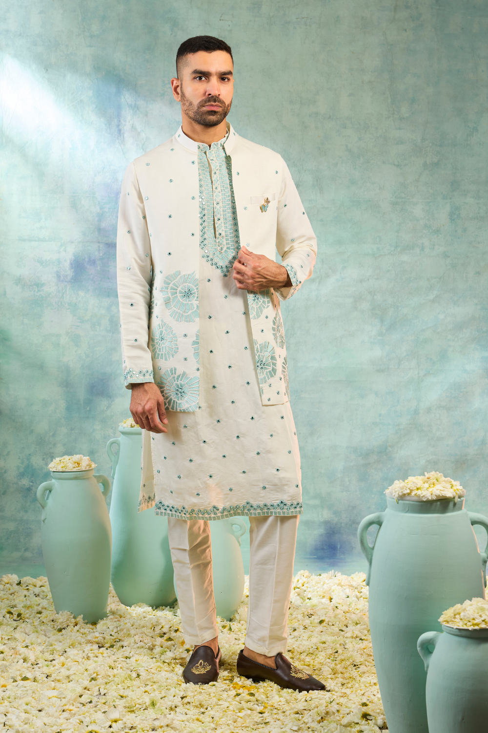 Pearl white kurta set with mint coloured thread work and mirror work