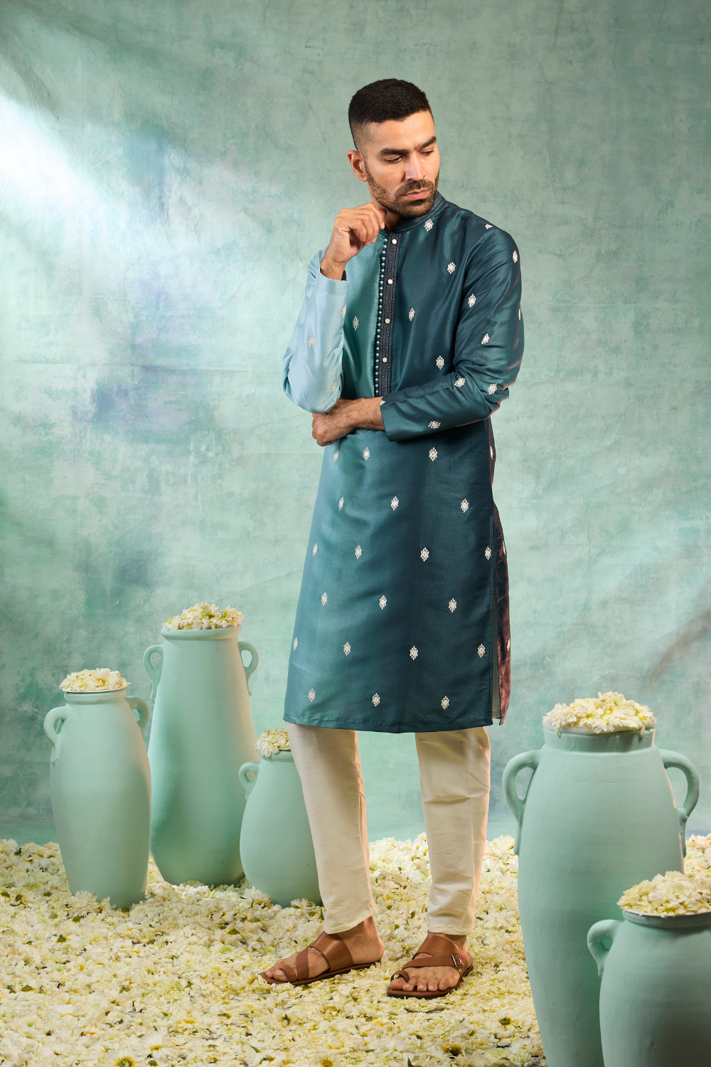 Blue silk kurta set with white motifs