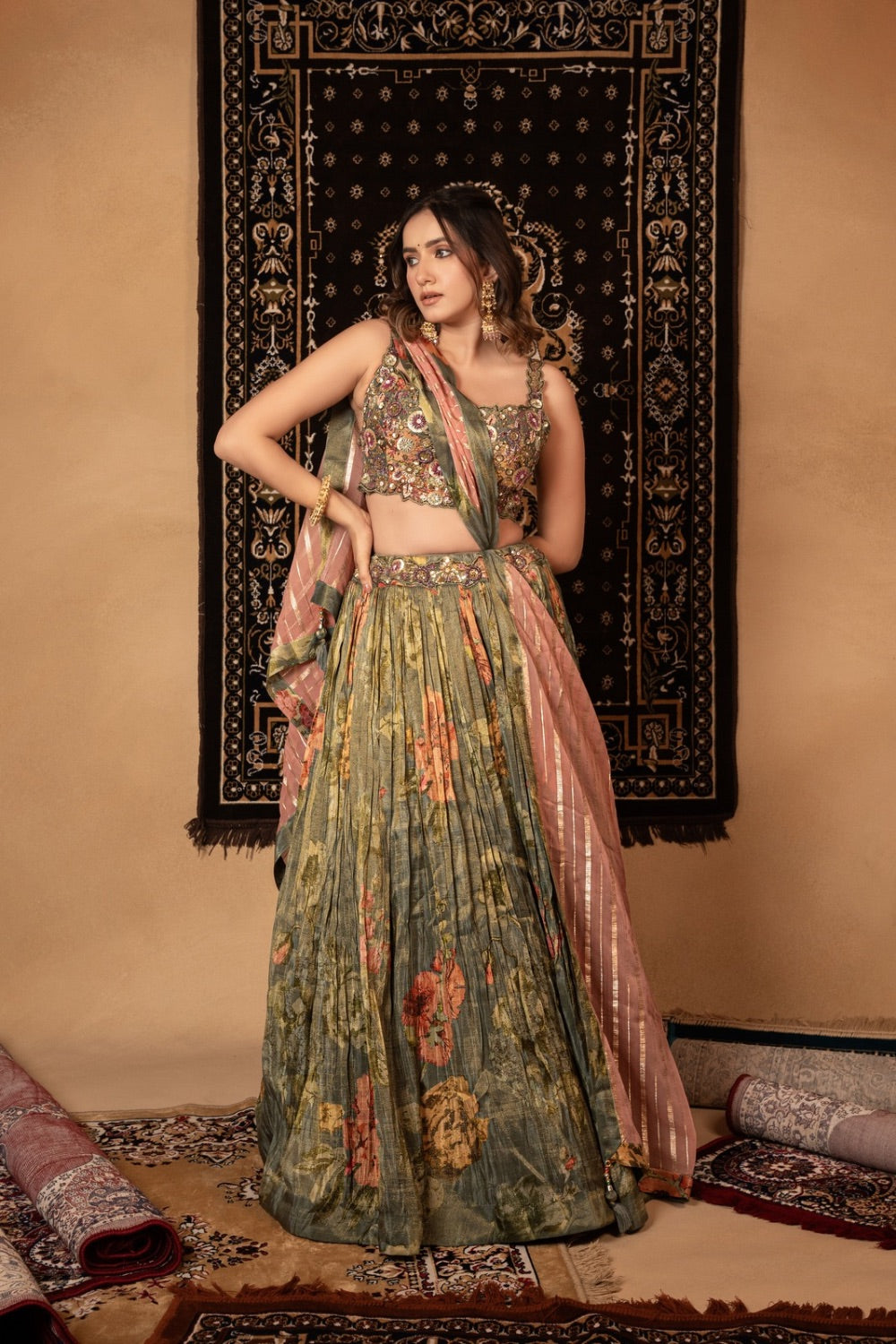 Sage green tissue printed silk lehenga choli with knot and cut dana work