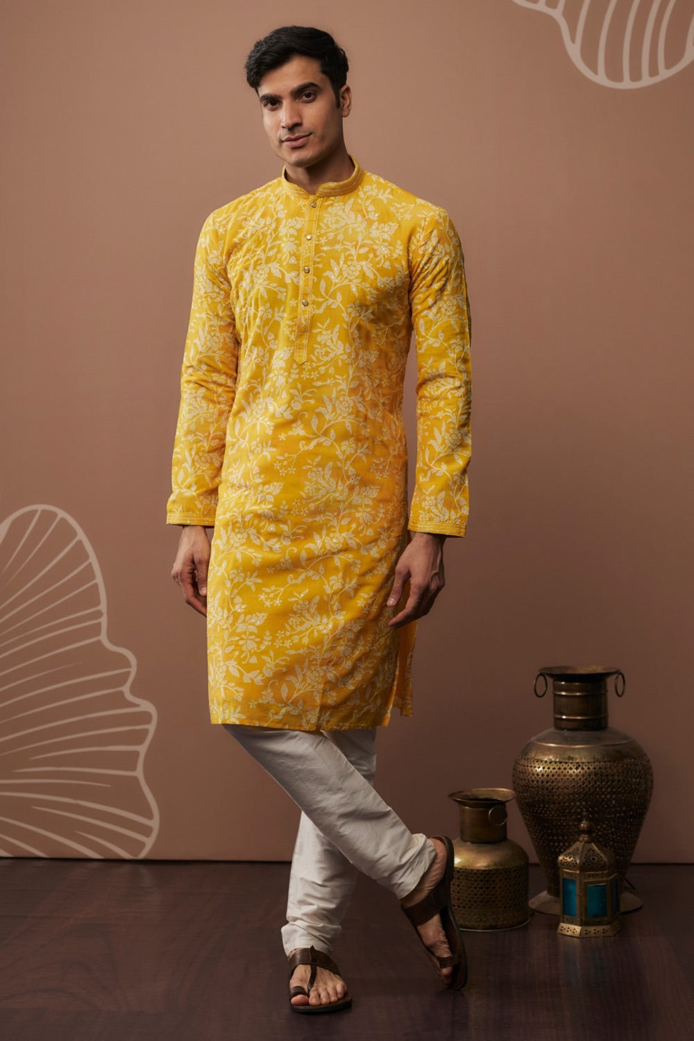 Bright yellow silk kurta and pajama with hand and machine work