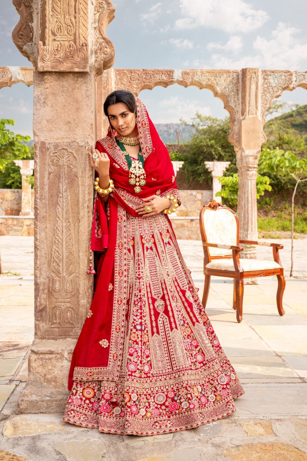 Red raw silk zardozi embroidered bridal lehenga choli with resham and sequin work