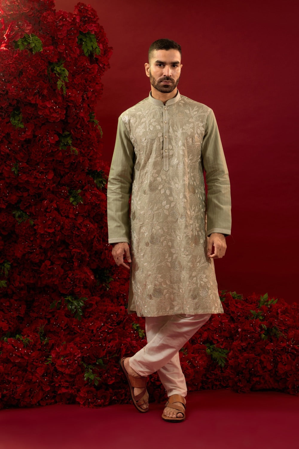 Sage green silk kurta set with machine work