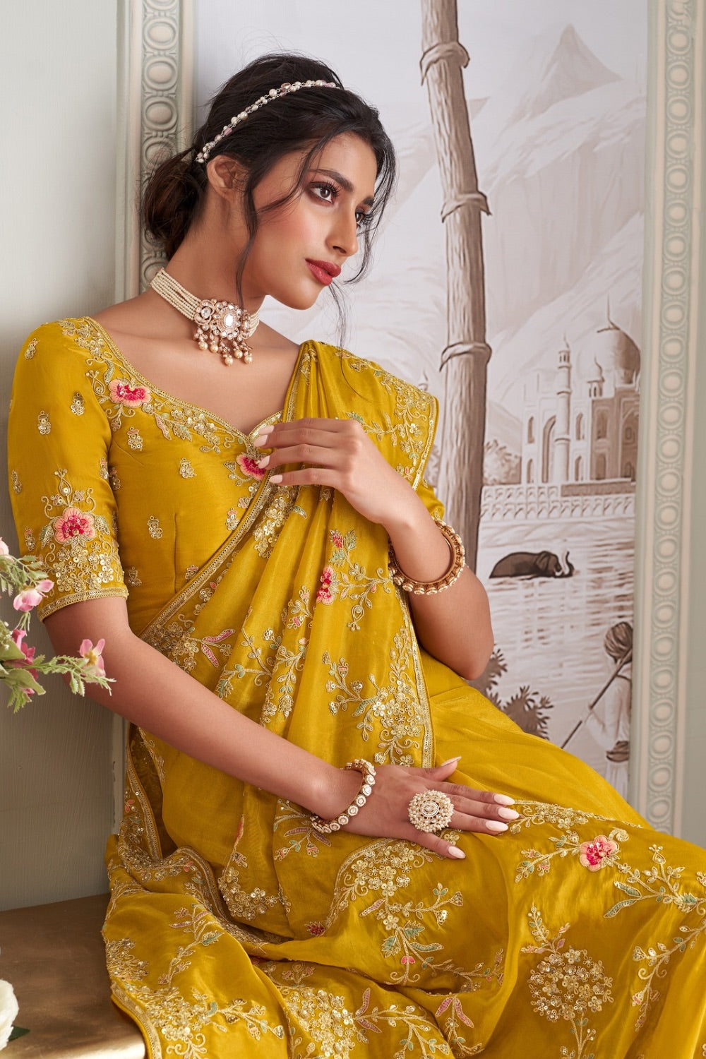 Bright yellow organza silk saree with unstitched blouse