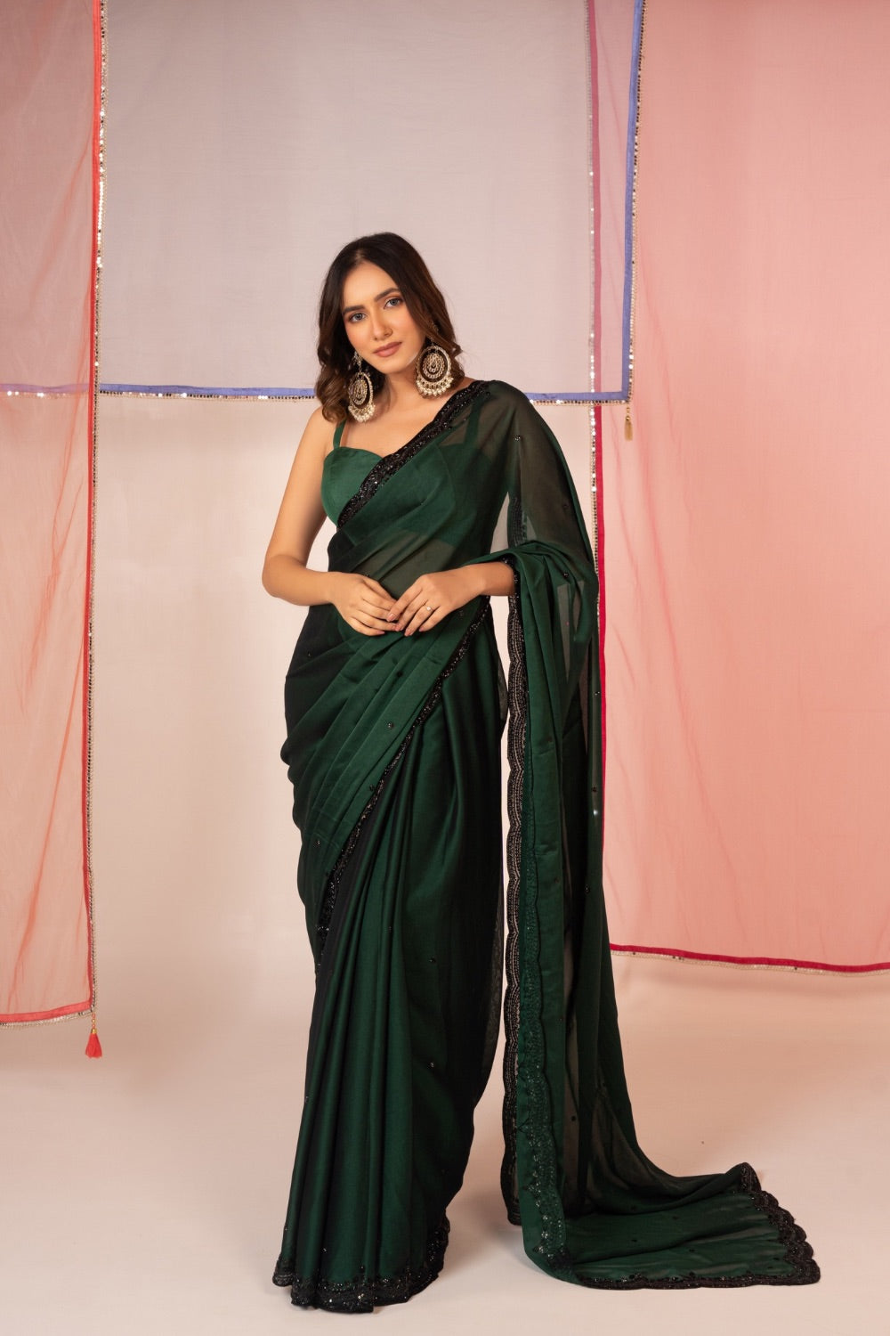 Bottle green satin silk saree and unstitched blouse piece