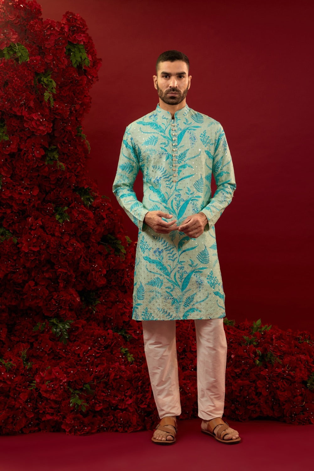 Blue silk kurta set with hand and machine work