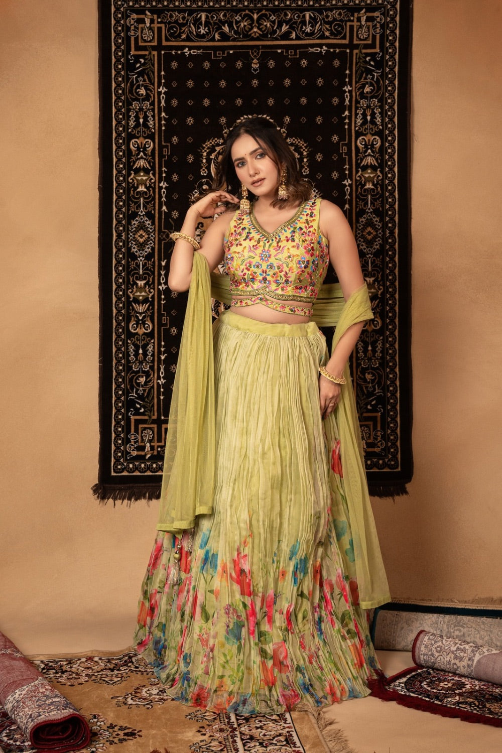 Tea green georgette lehenga choli with resham and mirror work