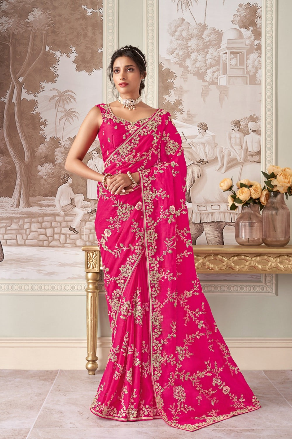 Fuchsia pink organza silk saree with matching unstitched blouse