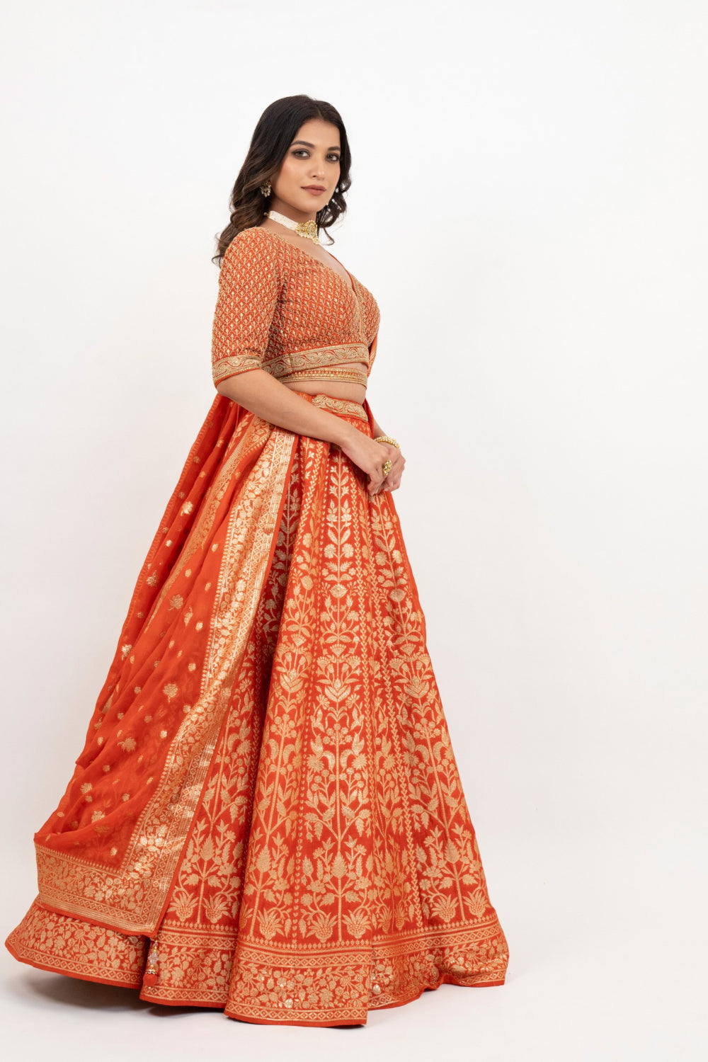 Orange banarasi silk zardozi embroidered lehenga choli with sequins work