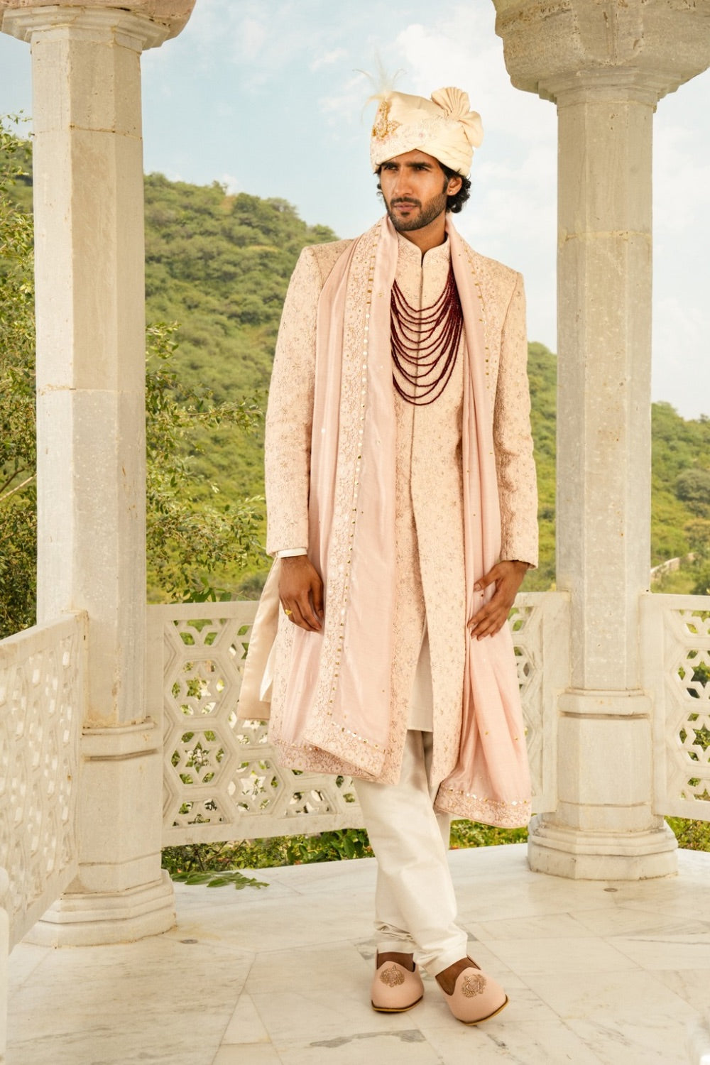 Peach lucknowi sherwani with hand cut dana and sequins work