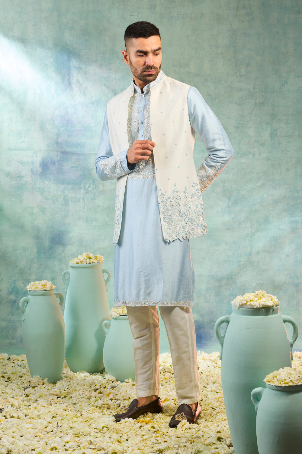 Baby blue silk kurta and pearl white koti with mirror embroidery and thread work