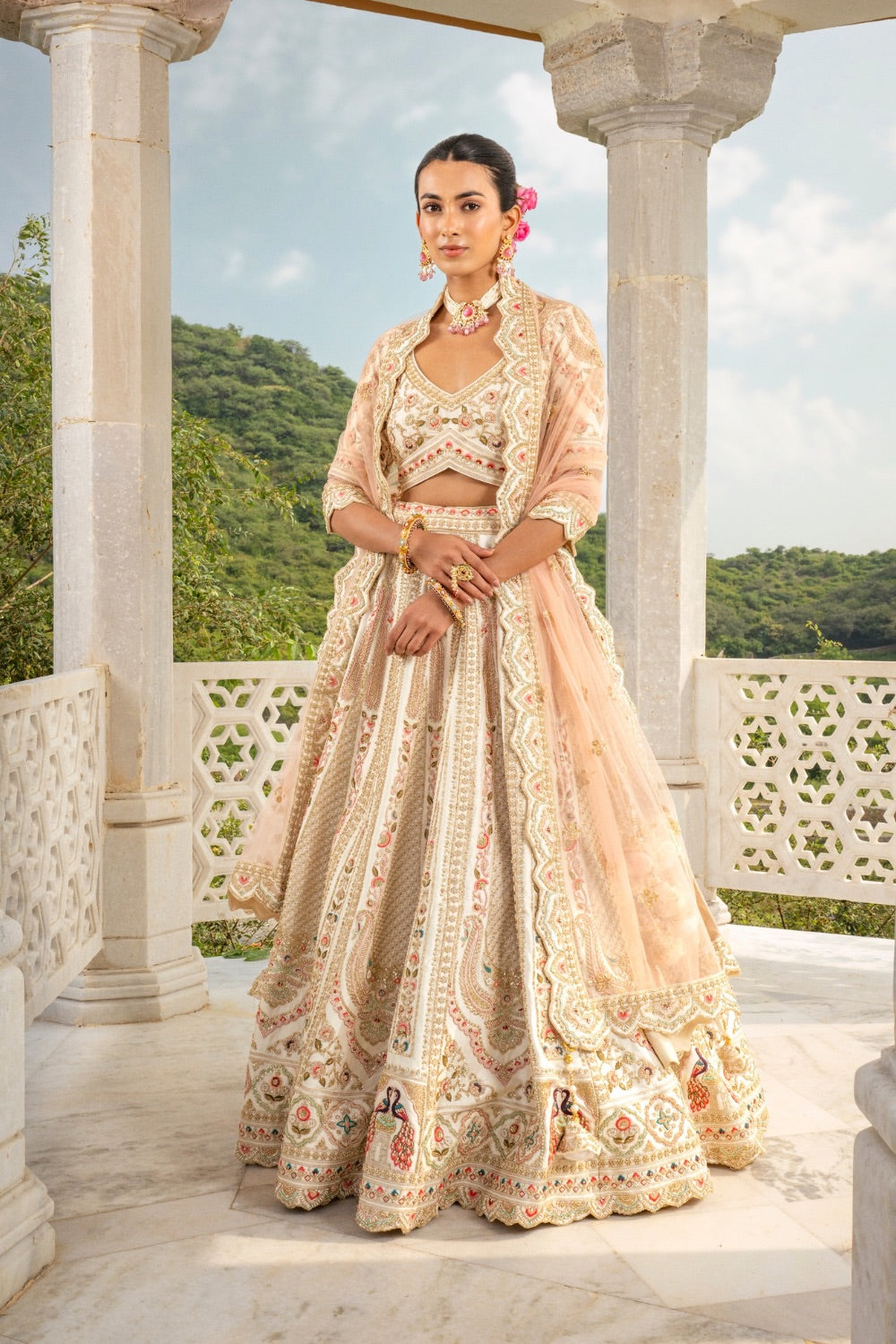 Soft champagne raw silk zardozi embroidered lehenga choli with hand cut dana, thread and pearl work